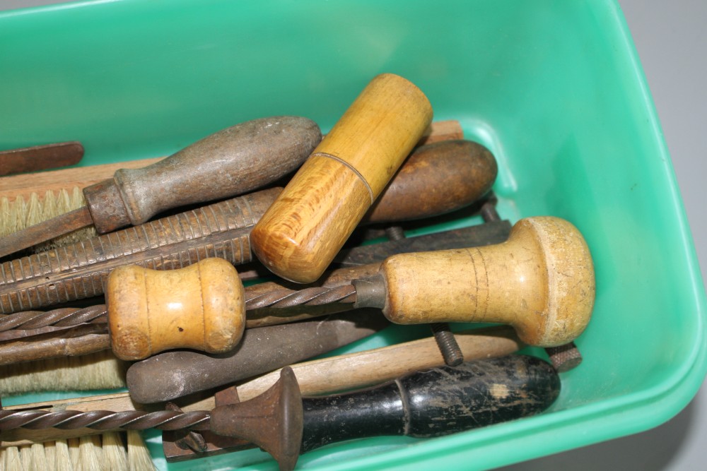 A group of assorted old and antique tools